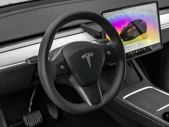 Tesla Model Y — Фото автомобиля 15