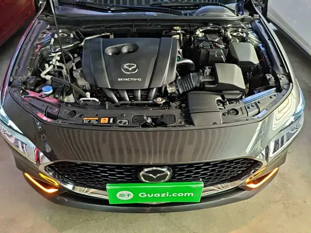 Mazda Axela — Фото автомобиля 19