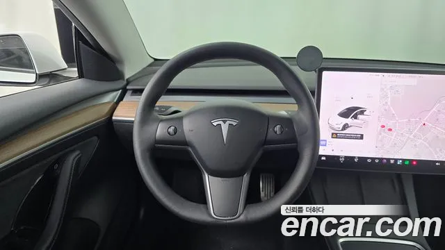 Tesla Model 3 — Фото автомобиля 19
