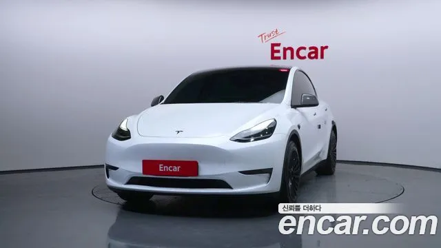 Tesla Model Y — Фото автомобиля 3