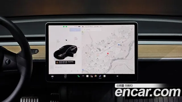 Tesla Model 3 — Фото автомобиля 12
