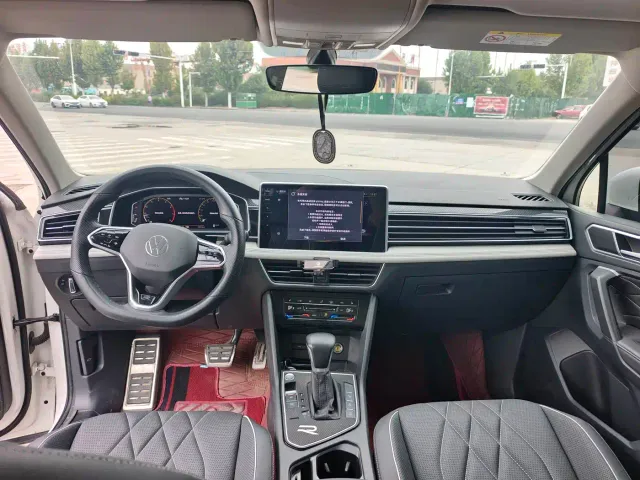 Volkswagen Tiguan L — Фото автомобиля 9