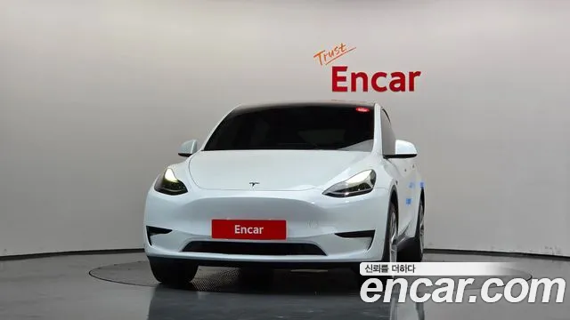 Tesla Model Y — Фото автомобиля 3