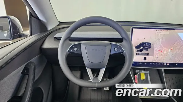 Tesla Model Y — Фото автомобиля 13