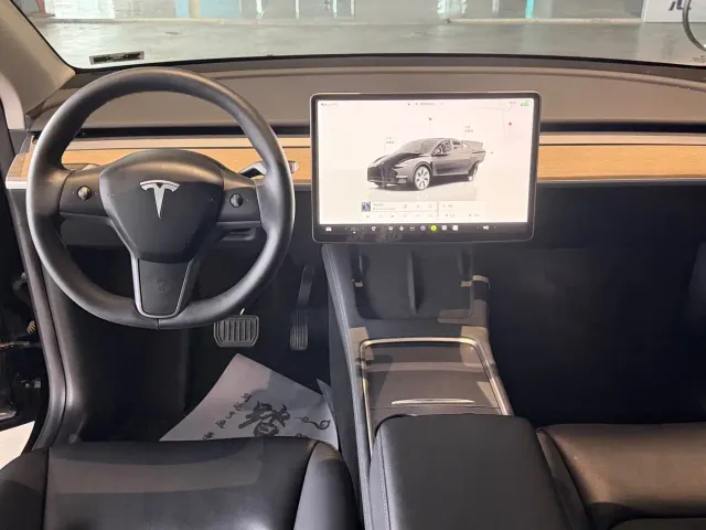 Tesla Model Y — Фото автомобиля 7