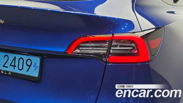Tesla Model Y — Фото автомобиля 8