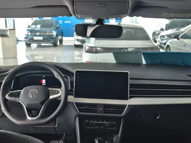 Volkswagen Tiguan L — Фото автомобиля 11
