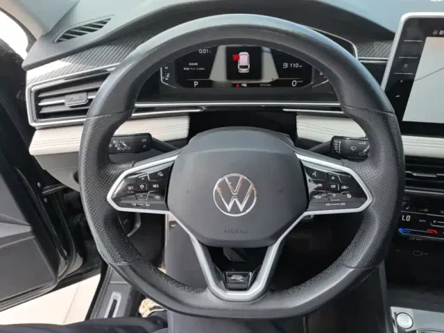 Volkswagen Tiguan L — Фото автомобиля 10