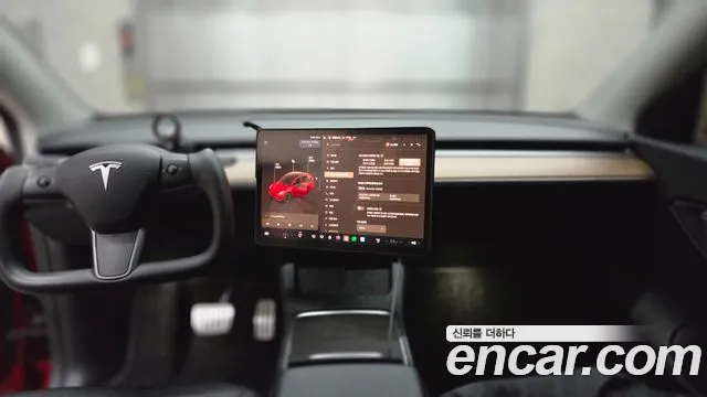 Tesla Model Y — Фото автомобиля 7