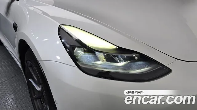 Tesla Model 3 — Фото автомобиля 7