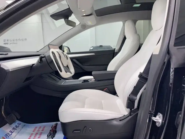 Tesla Model Y — Фото автомобиля 7