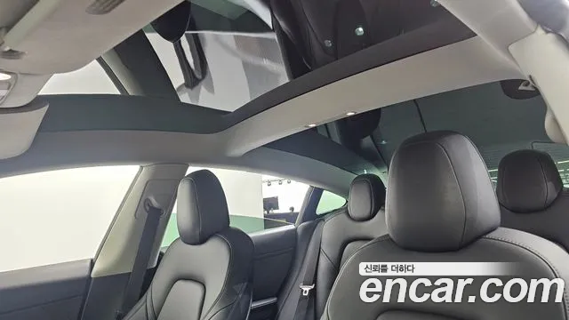 Tesla Model 3 — Фото автомобиля 14