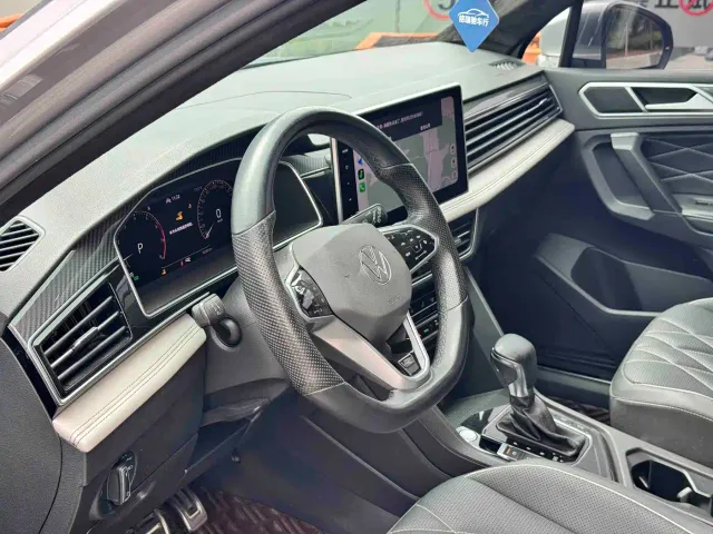 Volkswagen Tiguan L — Фото автомобиля 6