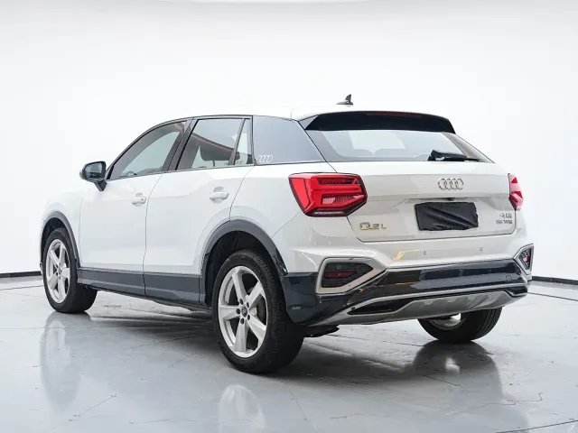 Audi Q2L — Фото автомобиля 11