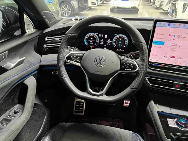 Volkswagen Tiguan L — Фото автомобиля 11