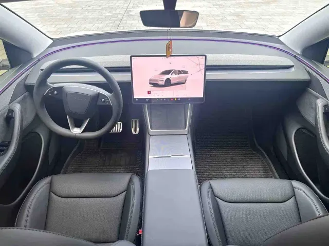 Tesla Model Y — Фото автомобиля 7