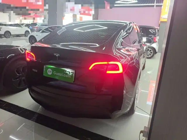 Tesla Model Y — Фото автомобиля 6