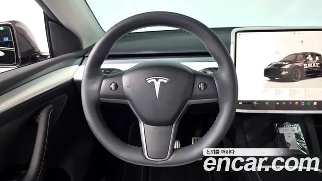 Tesla Model Y — Фото автомобиля 19