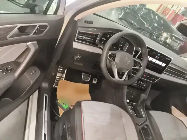Volkswagen Tiguan L — Фото автомобиля 11