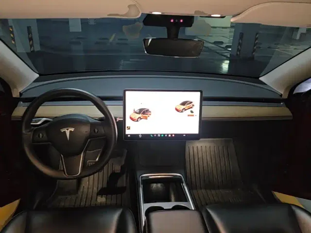 Tesla Model Y — Фото автомобиля 9