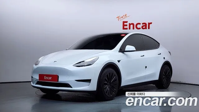 Tesla Model Y — Фото автомобиля 7