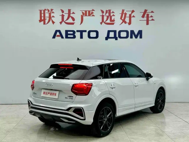 Audi Q2L — Фото автомобиля 7