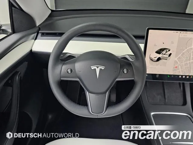 Tesla Model Y — Фото автомобиля 13
