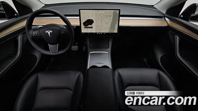 Tesla Model Y — Фото автомобиля 6