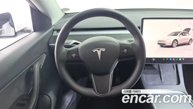 Tesla Model Y — Фото автомобиля 13