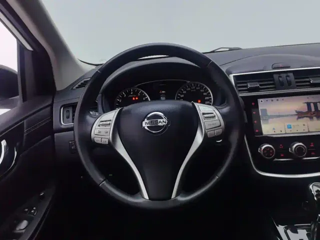 Nissan Tiida — Фото автомобиля 15