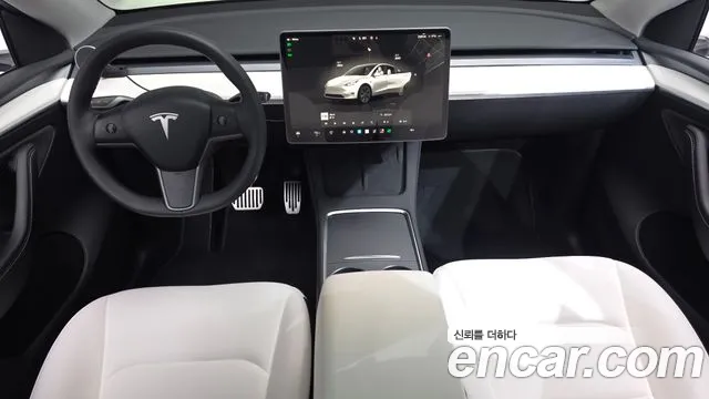 Tesla Model Y — Фото автомобиля 10
