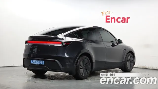 Tesla Model Y — Фото автомобиля 2