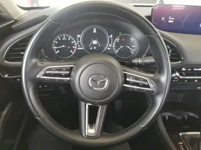 Mazda Axela — Фото автомобиля 10