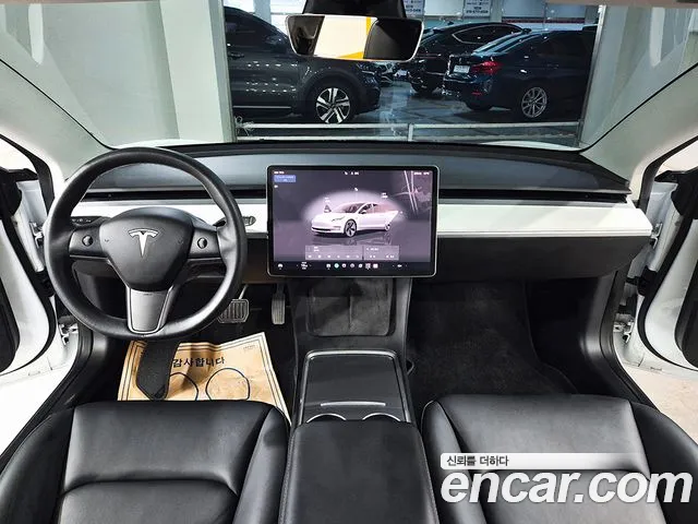 Tesla Model 3 — Фото автомобиля 7