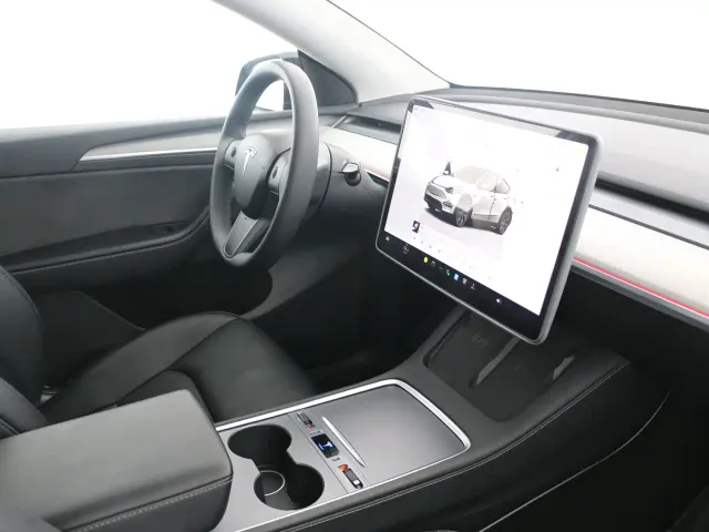 Tesla Model Y — Фото автомобиля 6