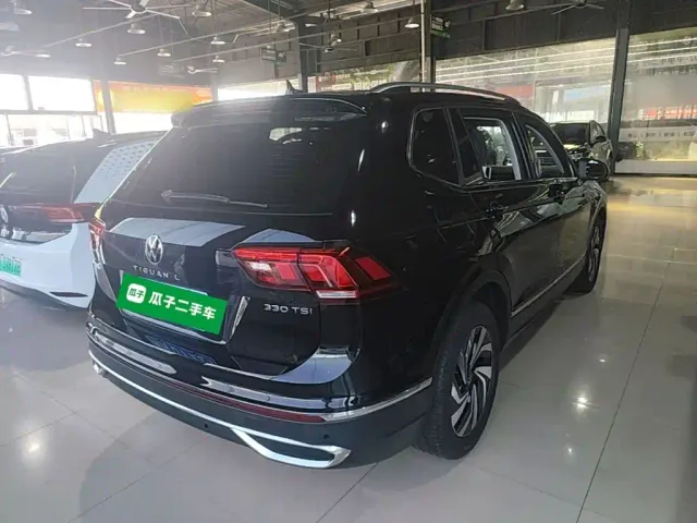Volkswagen Tiguan L — Фото автомобиля 6