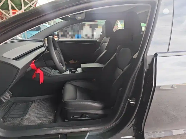 Tesla Model 3 — Фото автомобиля 11