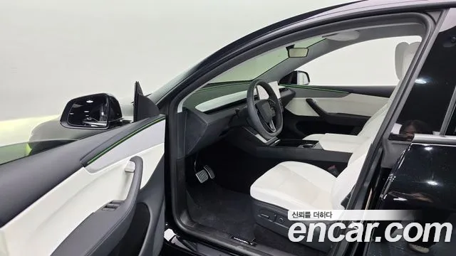 Tesla Model Y — Фото автомобиля 15