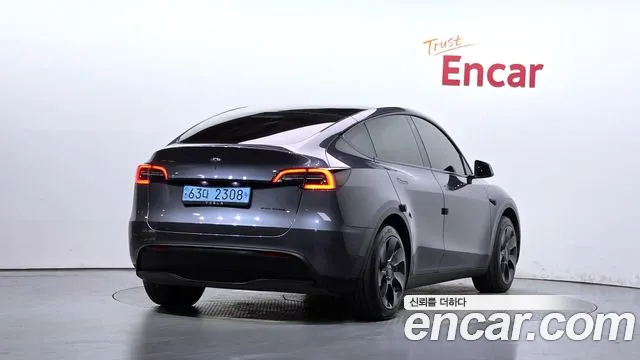Tesla Model Y — Фото автомобиля 2
