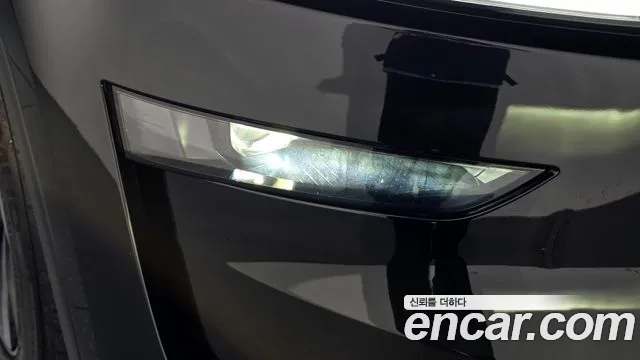 Tesla Model Y — Фото автомобиля 7