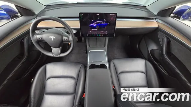 Tesla Model 3 — Фото автомобиля 10
