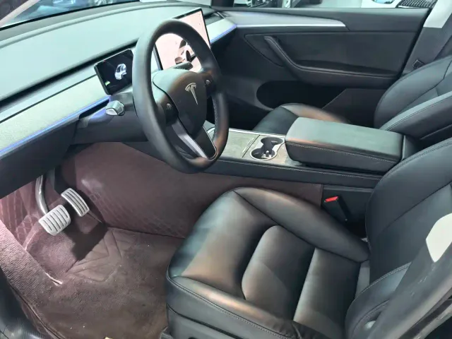 Tesla Model Y — Фото автомобиля 8