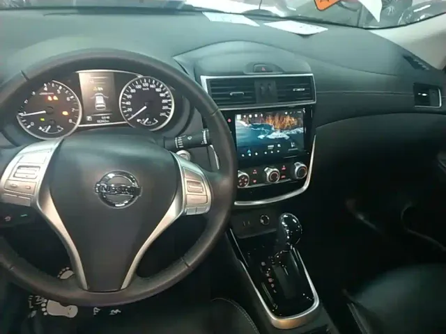 Nissan Tiida — Фото автомобиля 9