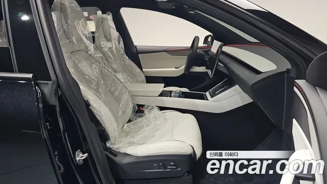 Tesla Model Y — Фото автомобиля 16