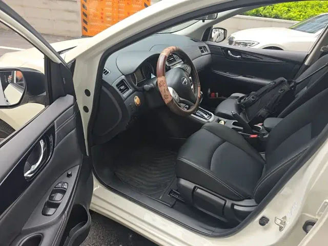 Nissan Tiida — Фото автомобиля 14