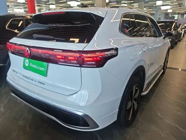 Volkswagen Tiguan L — Фото автомобиля 6