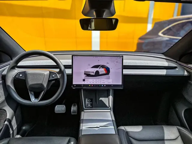 Tesla Model Y — Фото автомобиля 6