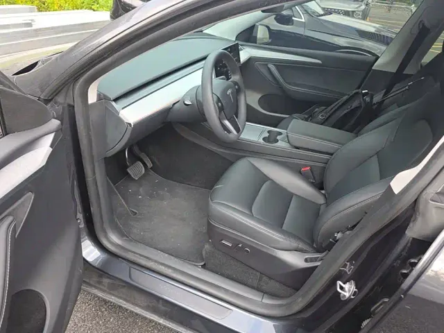 Tesla Model Y — Фото автомобиля 14