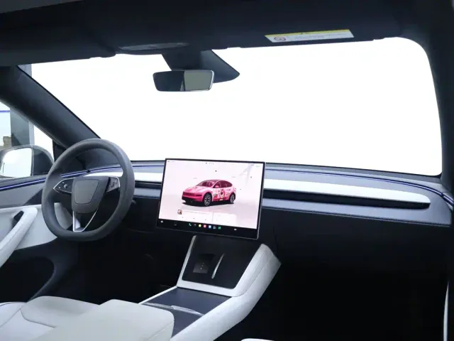Tesla Model Y L — Фото автомобиля 21