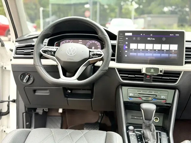 Volkswagen Tiguan L — Фото автомобиля 5
